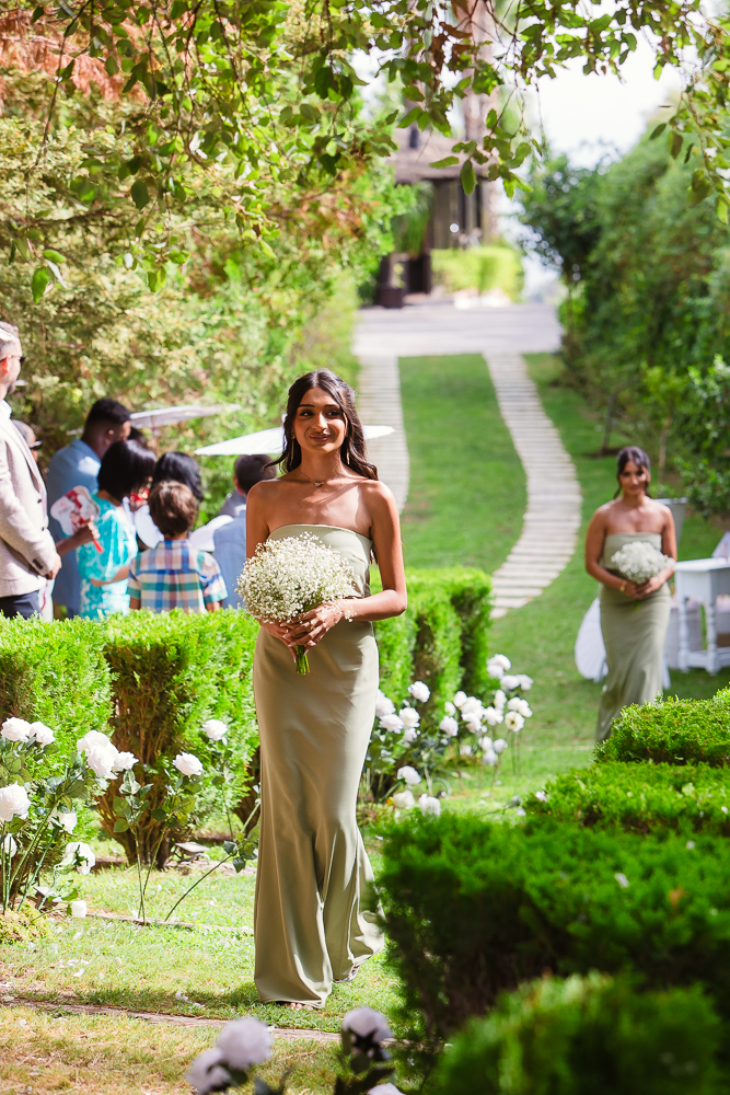 Bridesmaid arriving for the ceremony at Finca Villa Palma