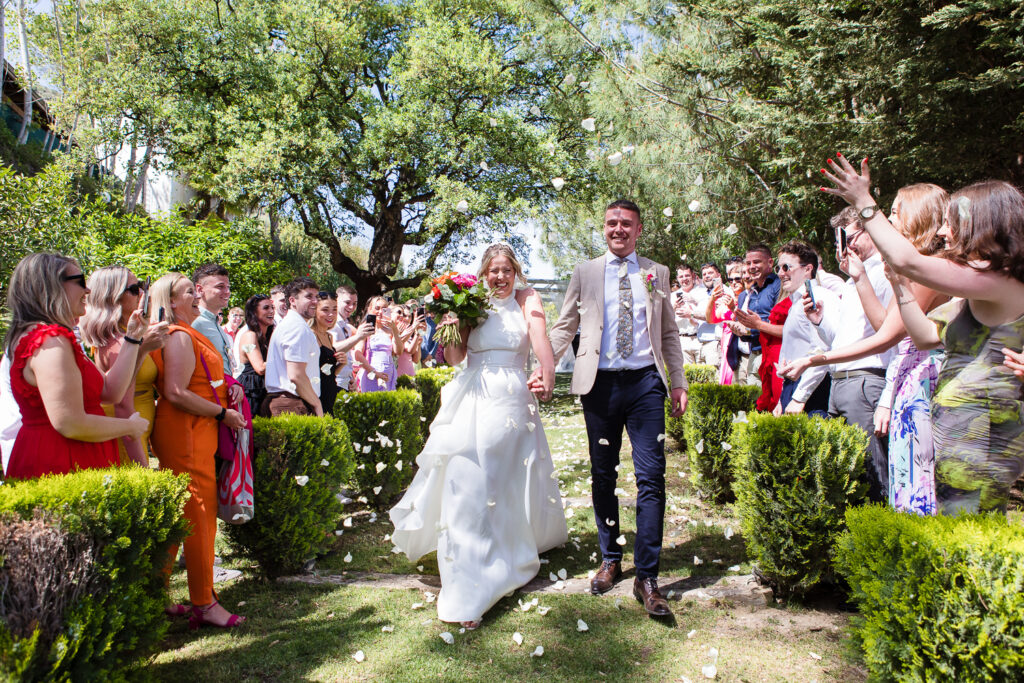 Showered in confetti at their Marbella wedding